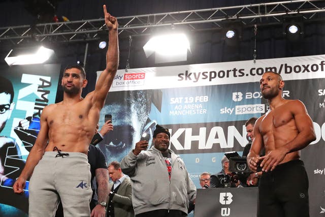 <p>Amir Khan (left) and Kell Brook after successfully making weight</p>