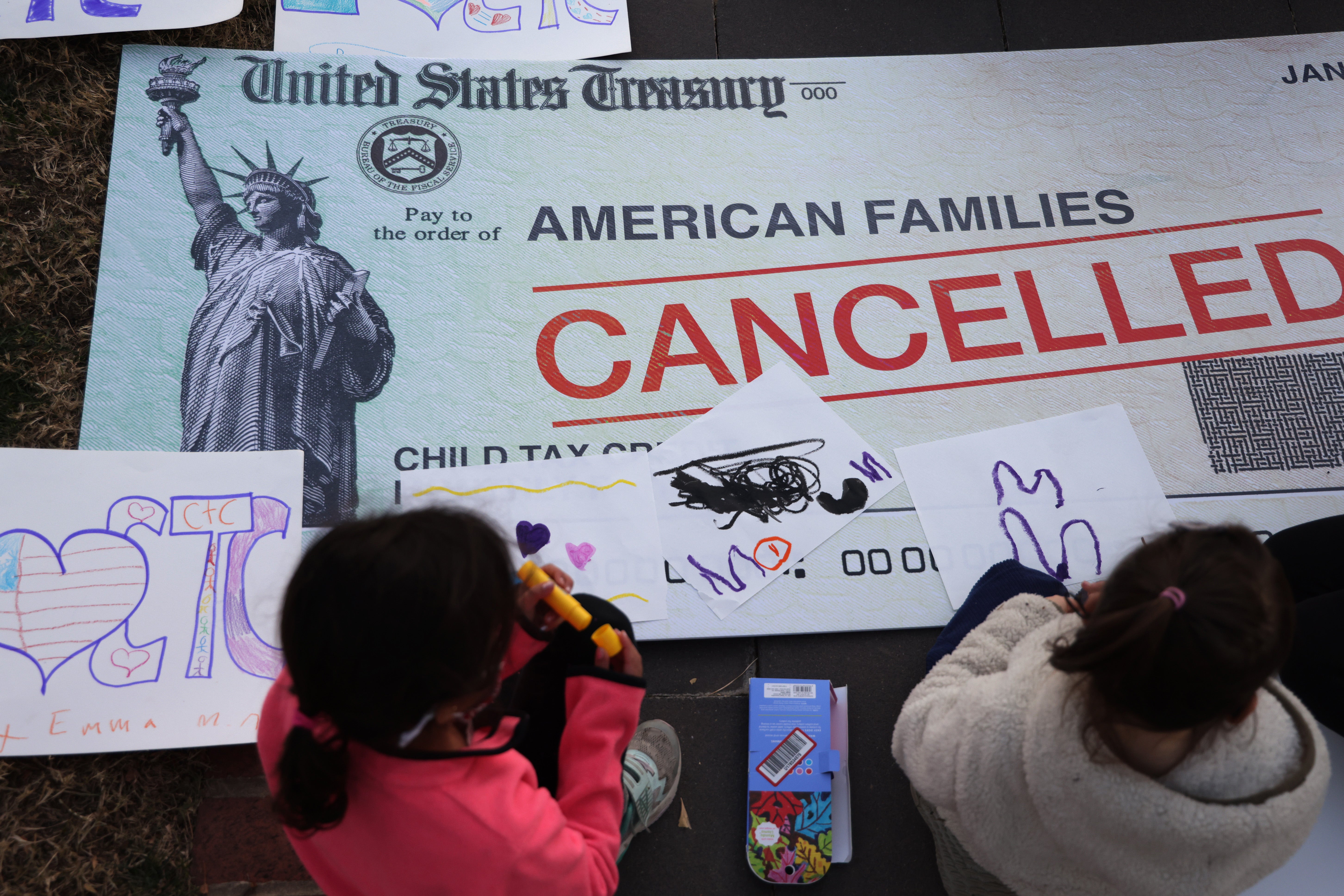 Families rallied in Washington DC in December 2021 to urge Congress to extend a tax credit that lifted millions of children out of poverty.