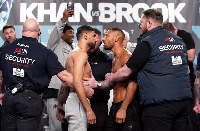<p>Amir Khan, left, and Kell Brook fight at the AO Arena in Manchester on Saturday night (Nick Potts/PA)</p>