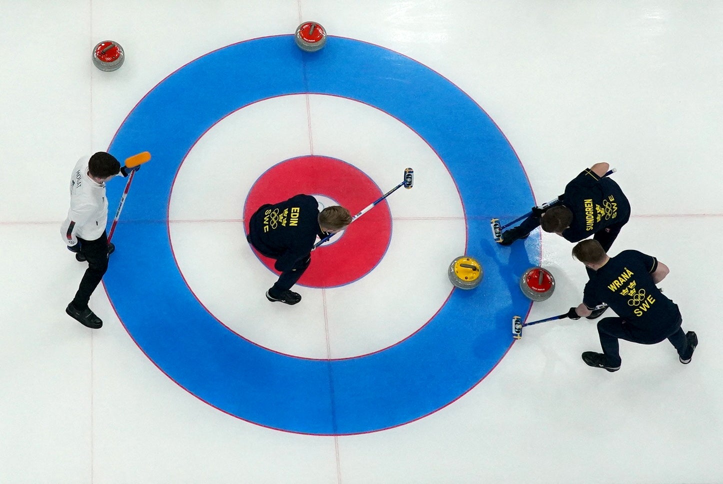 Action from the men’s curling final