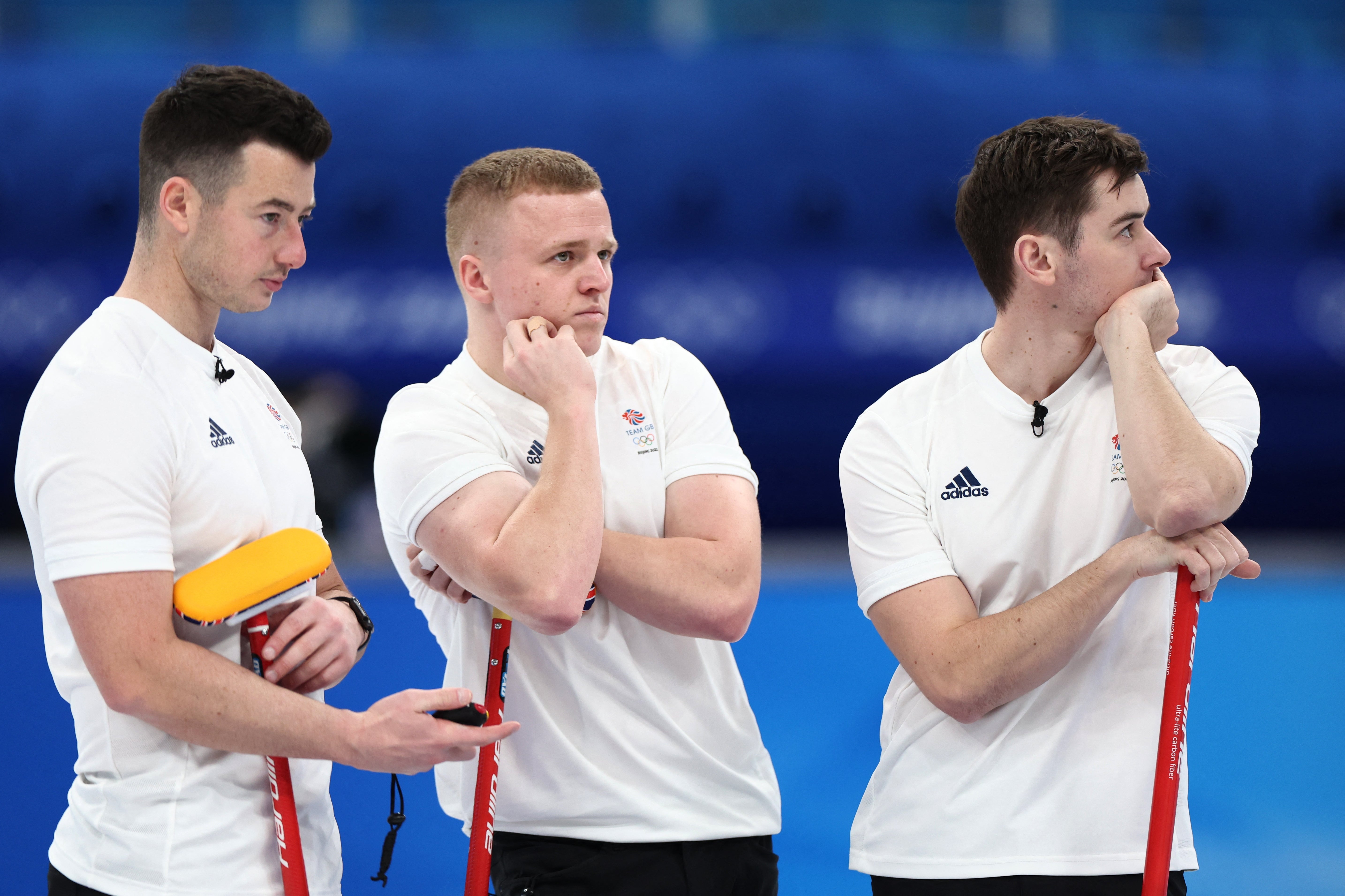 The British team react to defeat