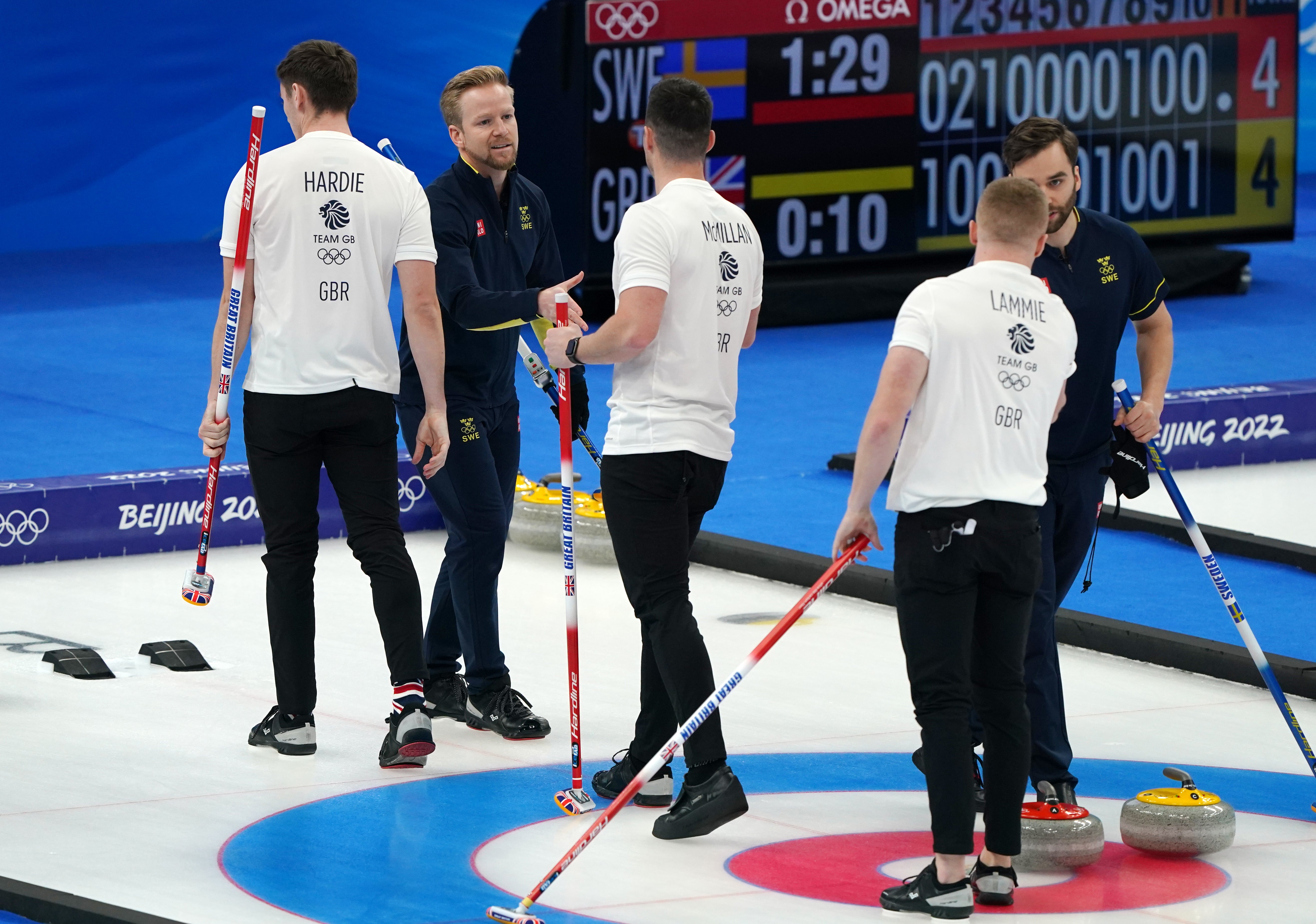 Great Britain shake hands with Sweden at the end of the contest (Andrew Milligan/PA)