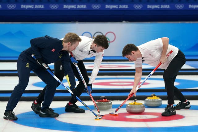 Team GB competing against Sweden in the curling final (Andrew Milligan/PA)
