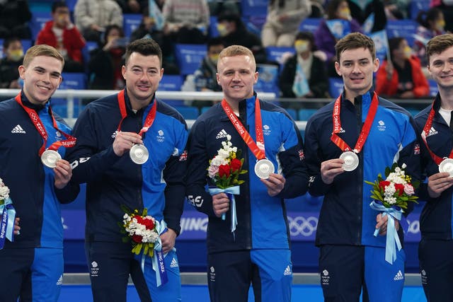 Great Britain’s Ross Whyte, Hammy McMillan, Bobby Lammie, Grant Hardie and Bruce Mouat with their silver medals after losing narrowly to Sweden in the men’s curling final (Andrew Milligan/PA)