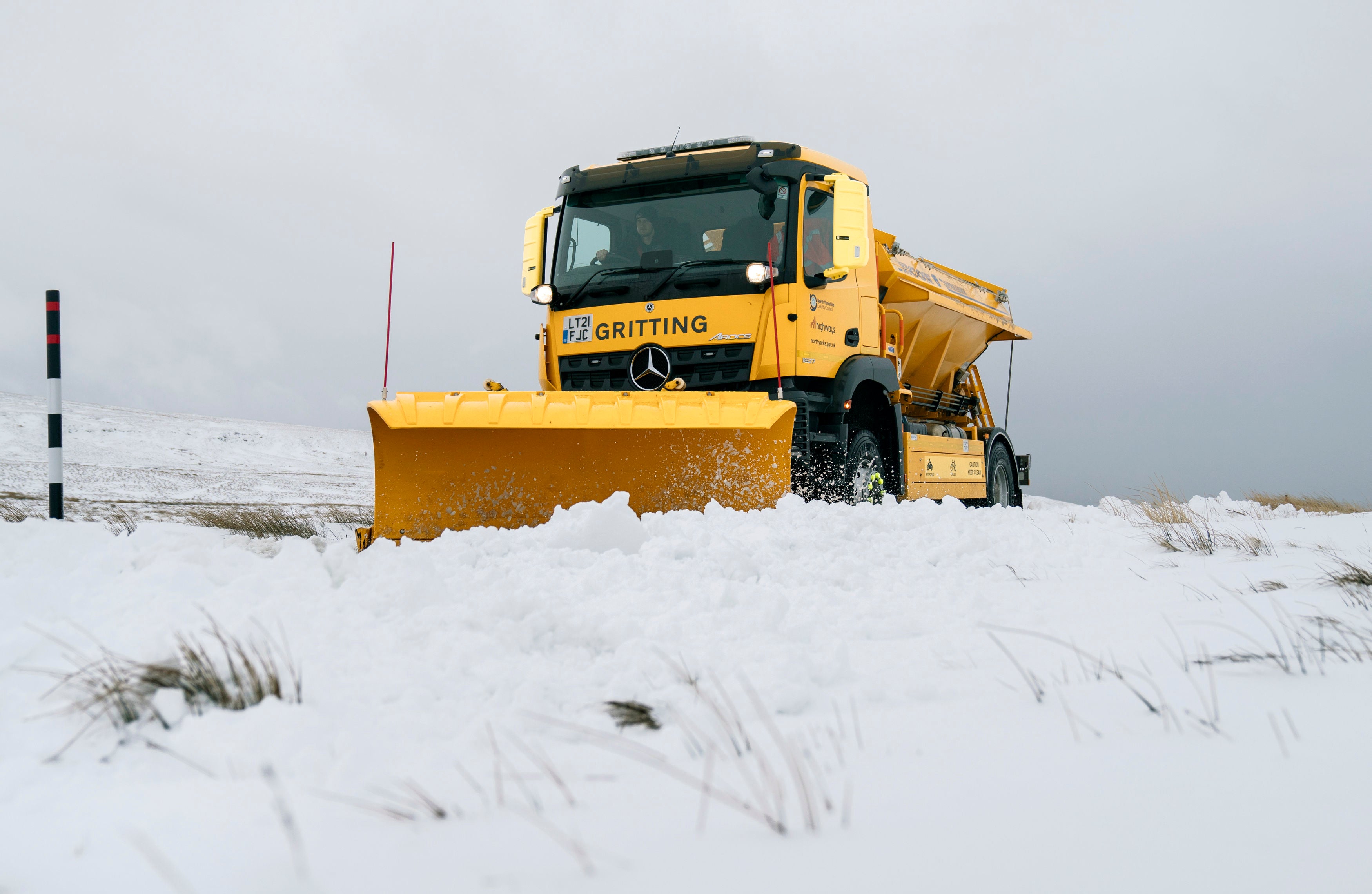 A snow plough on the Buttertubs Pass near Hawes, North Yorkshire