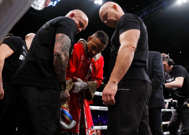 <p>Kell Brook’s gloves are changed moments before his bout with Amir Khan </p>