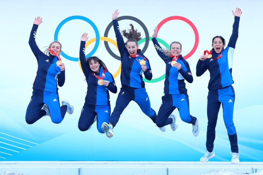 (L-R) Curlers Milli Smith, Hailey Duff, Jennifer Dodds, Vicky Wright and Eve Muirhead of Team Great Britain pose for pictures after winning the Gold Medal in the Women's Curling against Team Japan at National Aquatics Centre on February 20, 2022