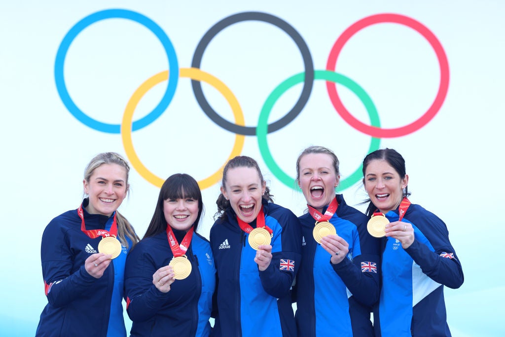 Golden smiles: curlers (from left) Milli Smith, Hailey Duff, Jennifer Dodds, Vicky Wright and Eve Muirhead