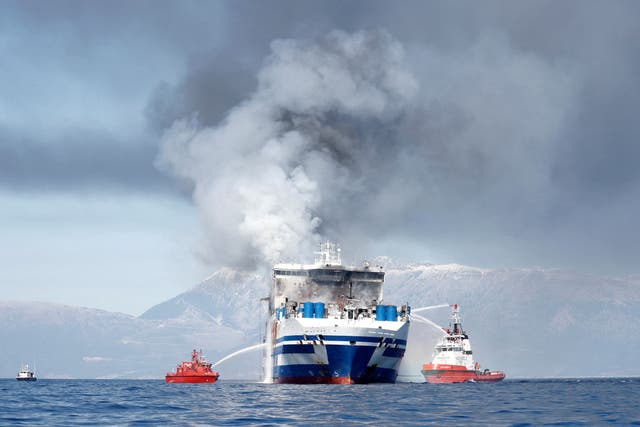<p>Smoke rises from the Euroferry Olympia which sailed from Greece to Italy and caught fire off the coast of Corfu</p>