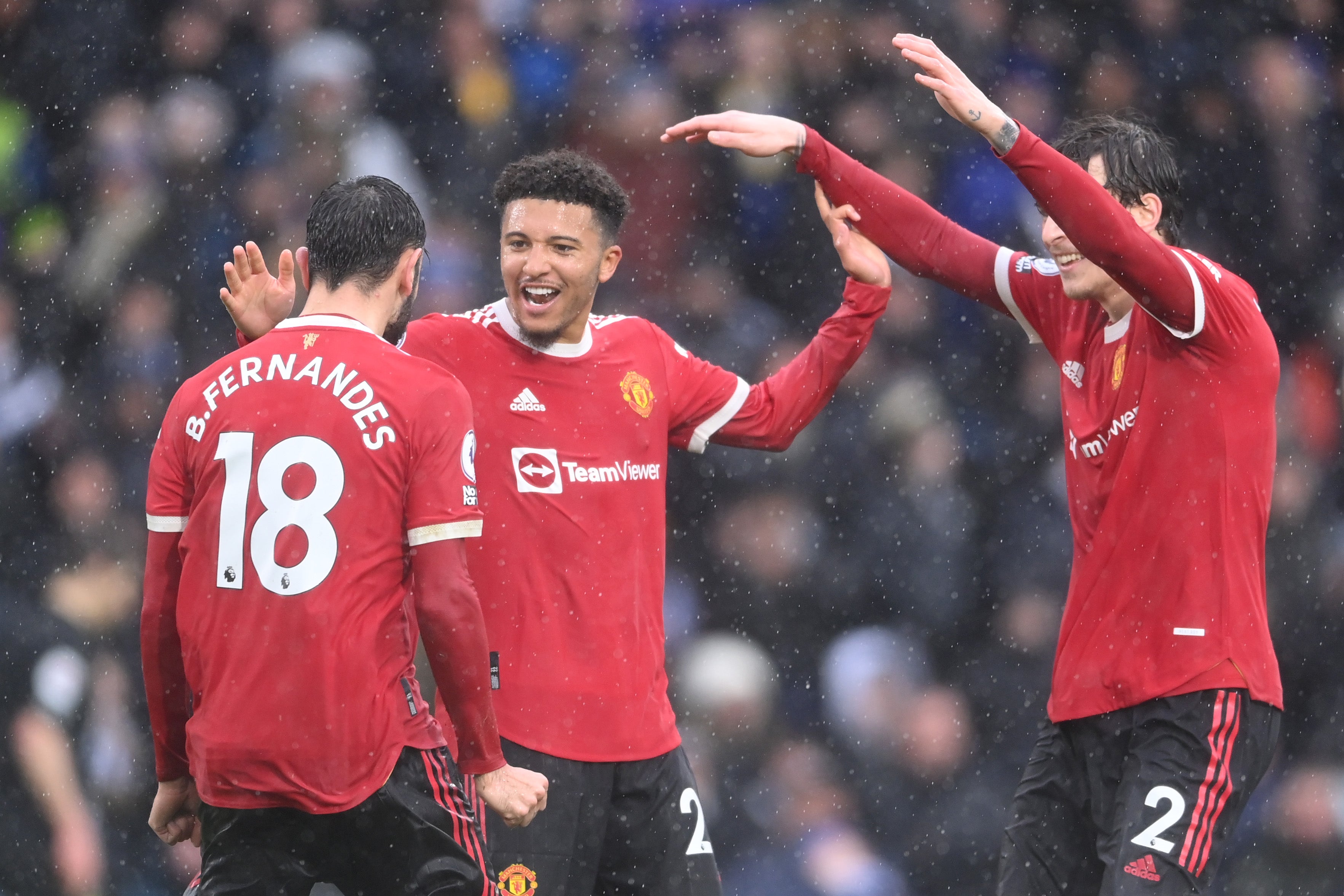 Manchester United rise above the storm in throwback Premier League