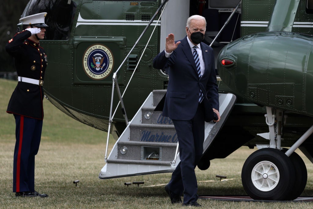 President Joe Biden exits Marine One on the White House lawn