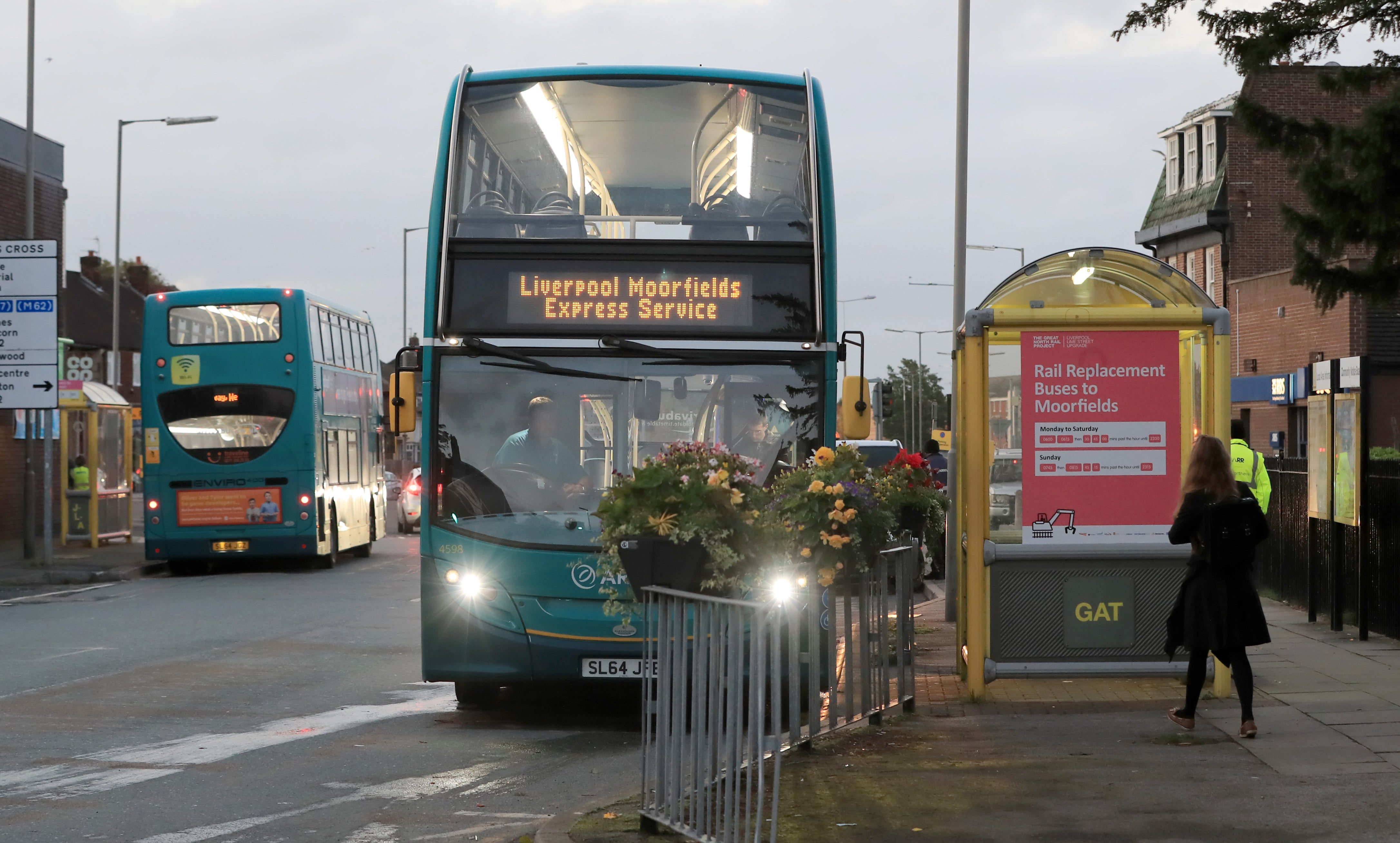 Bus services outside Hunts Cross station in Liverpool (Peter Byrne/PA)
