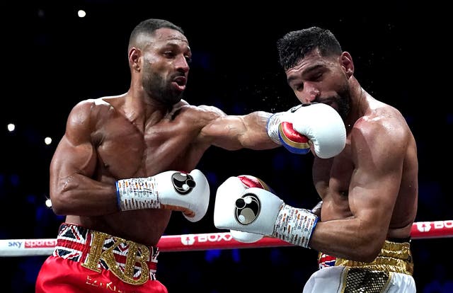 <p>Kell Brook (left) in action against Amir Khan at Manchester’s AO Arena (Nick Potts/PA)</p>