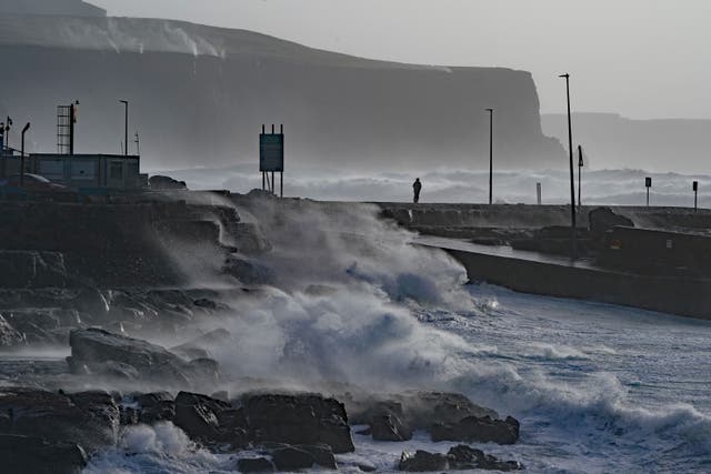 Storm Franklin has sparked evacuations in parts of the UK and caused widespread rush-hour travel disruption (Niall Carson/PA)