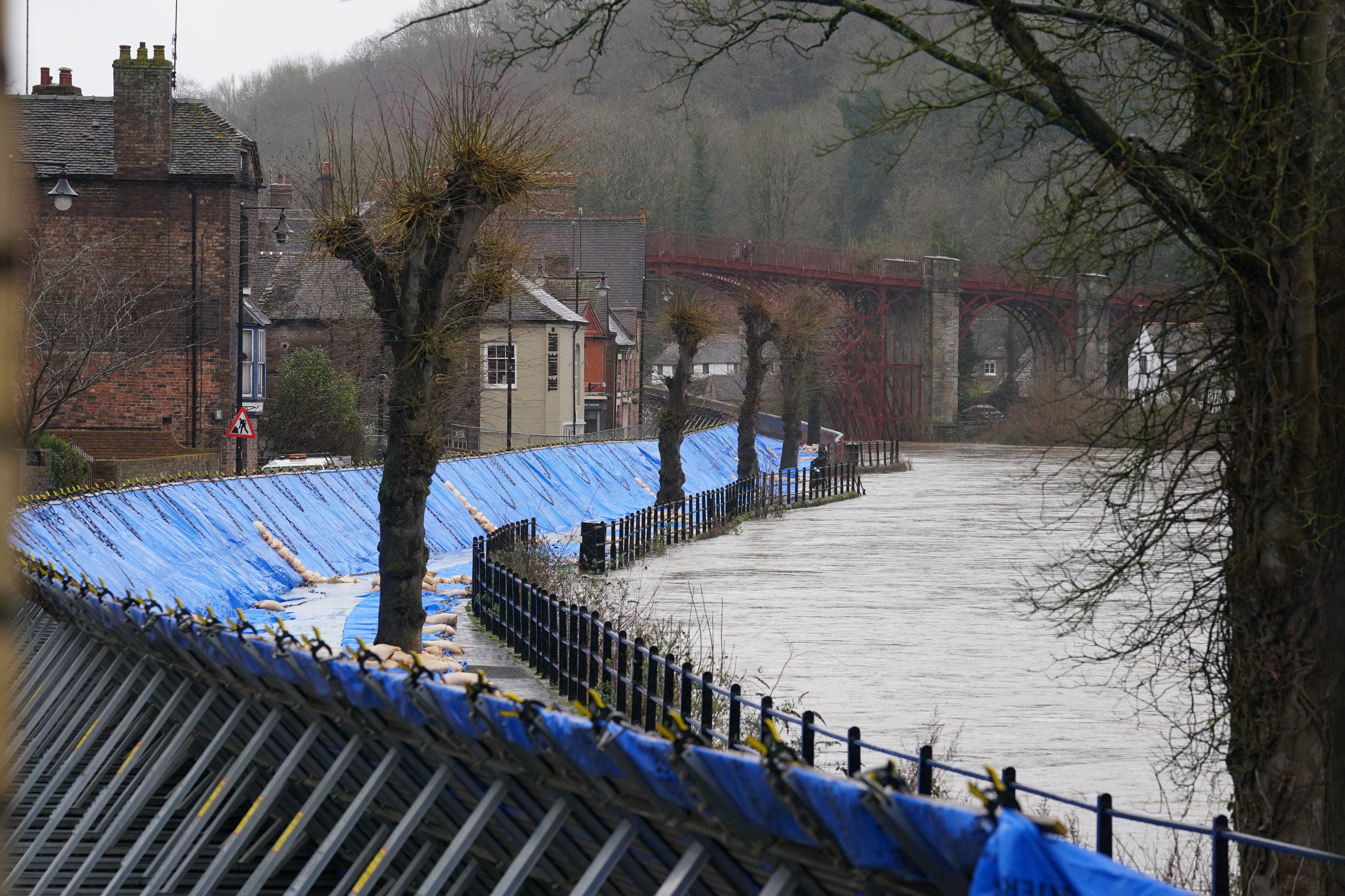 Floor barriers are erected along the River Severn in Ironbridge, Shropshire.