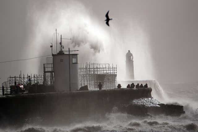 Huge waves hitting the sea wall at Porthcawl, Wales, after Storm Franklin moved in overnight (Ben Birchall/PA)