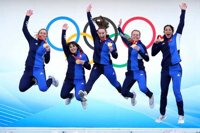 <p>Great Britain’s Mili Smith, Hailey Duff, Jennifer Dodds, Vicky Wright and Eve Muirhead celebrate curling gold medal success at the 2022 Winter Olympic Games</p>