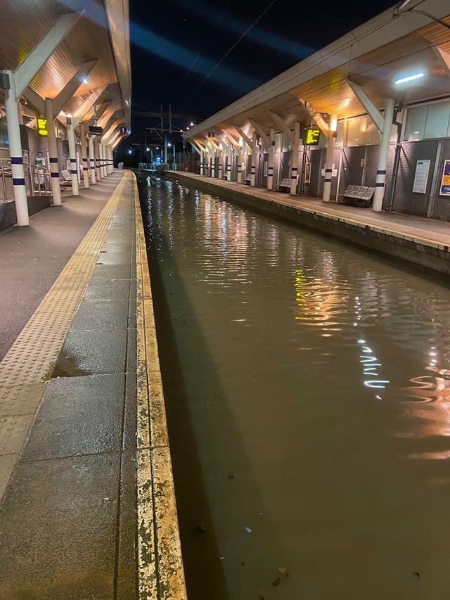 <p>Rotherham train station submerged in water as UK is hit with a third storm</p>