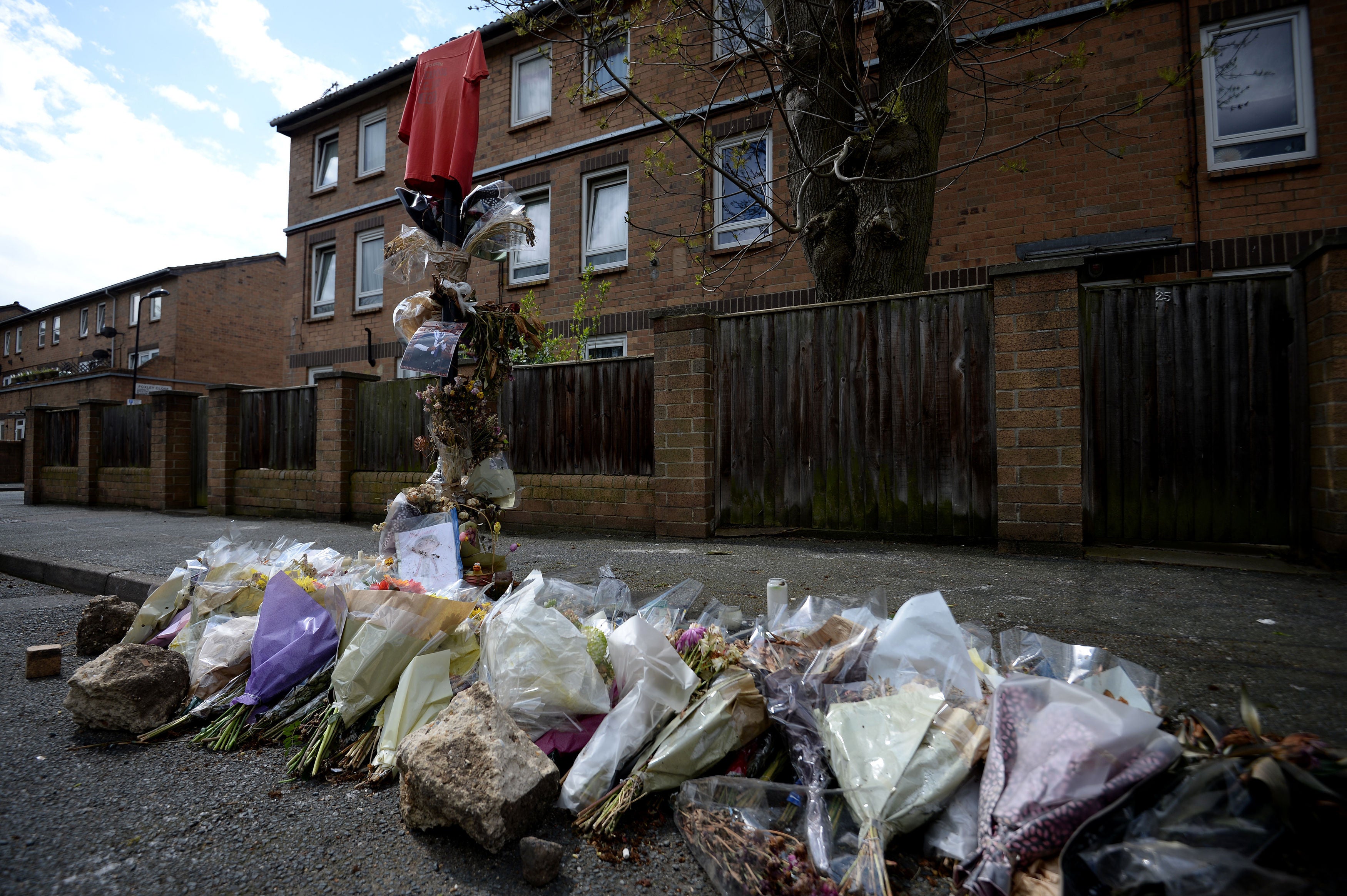 Tributes on Ferncliff Road in Hackney, where Mr Badru was shot dead