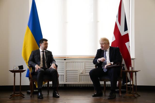 Ukrainian President Volodymyr Zelensky attends a meeting with Boris Johnson at the Munich Security Conference (Matt Dunham/PA)