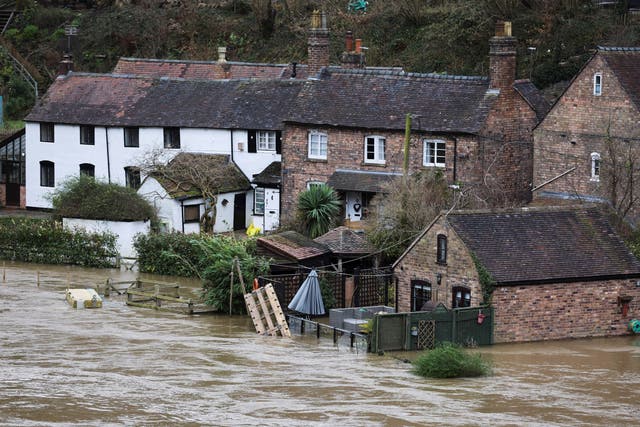 <p>Houses are flooded after high water levels on the River Severn in Ironbridge during Storm Franklin</p>