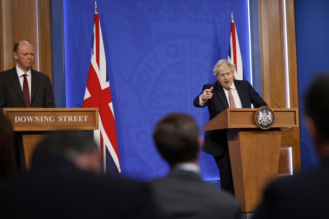 <p>Sir Chris Whitty (left), prime minister Boris Johnson, and Sir Patrick Vallance (right) during a media briefing in Downing Street</p>