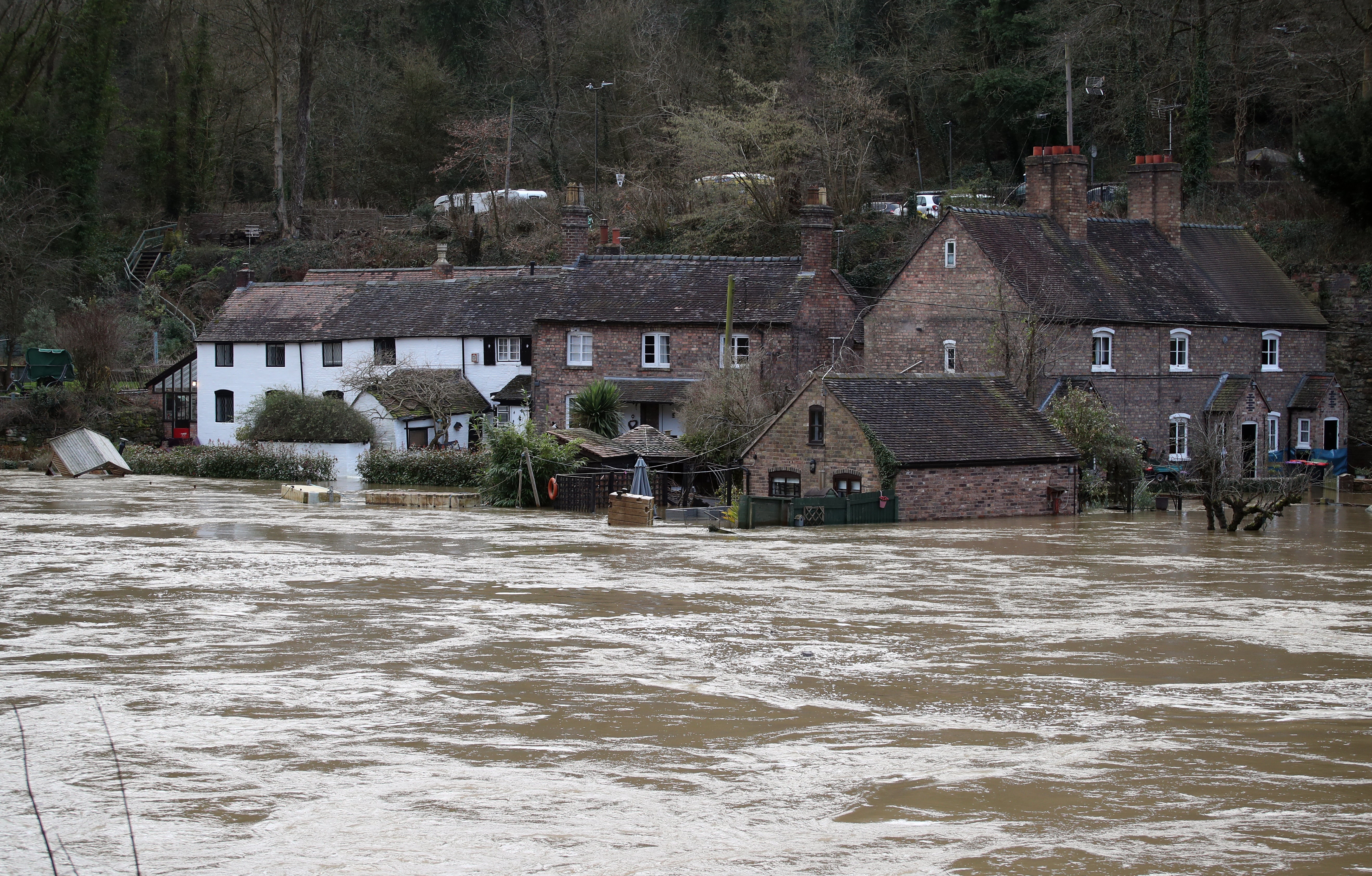 The Vic Haddock boat house under water on the River Severn following high winds and wet weather in Ironbridge, Shropshire