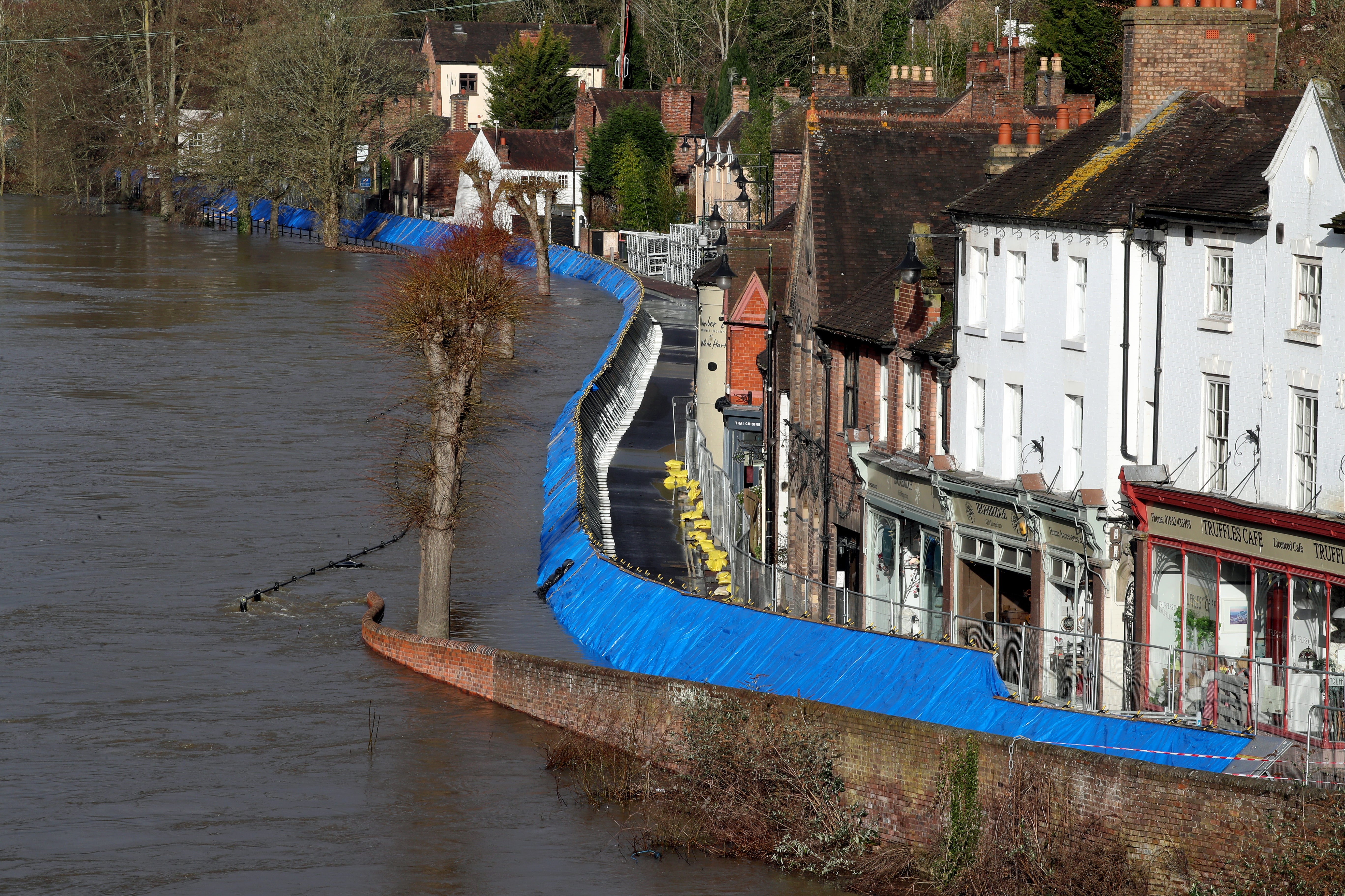 Flood defences along the Wharfage next to the River Severn following high winds and wet weather in Ironbridge, Shropshire