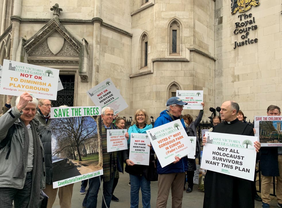 Protesters outside the Royal Courts of Justice in central London ahead of a hearing regarding the UK Holocaust Memorial (Tom Pilgrim/PA)