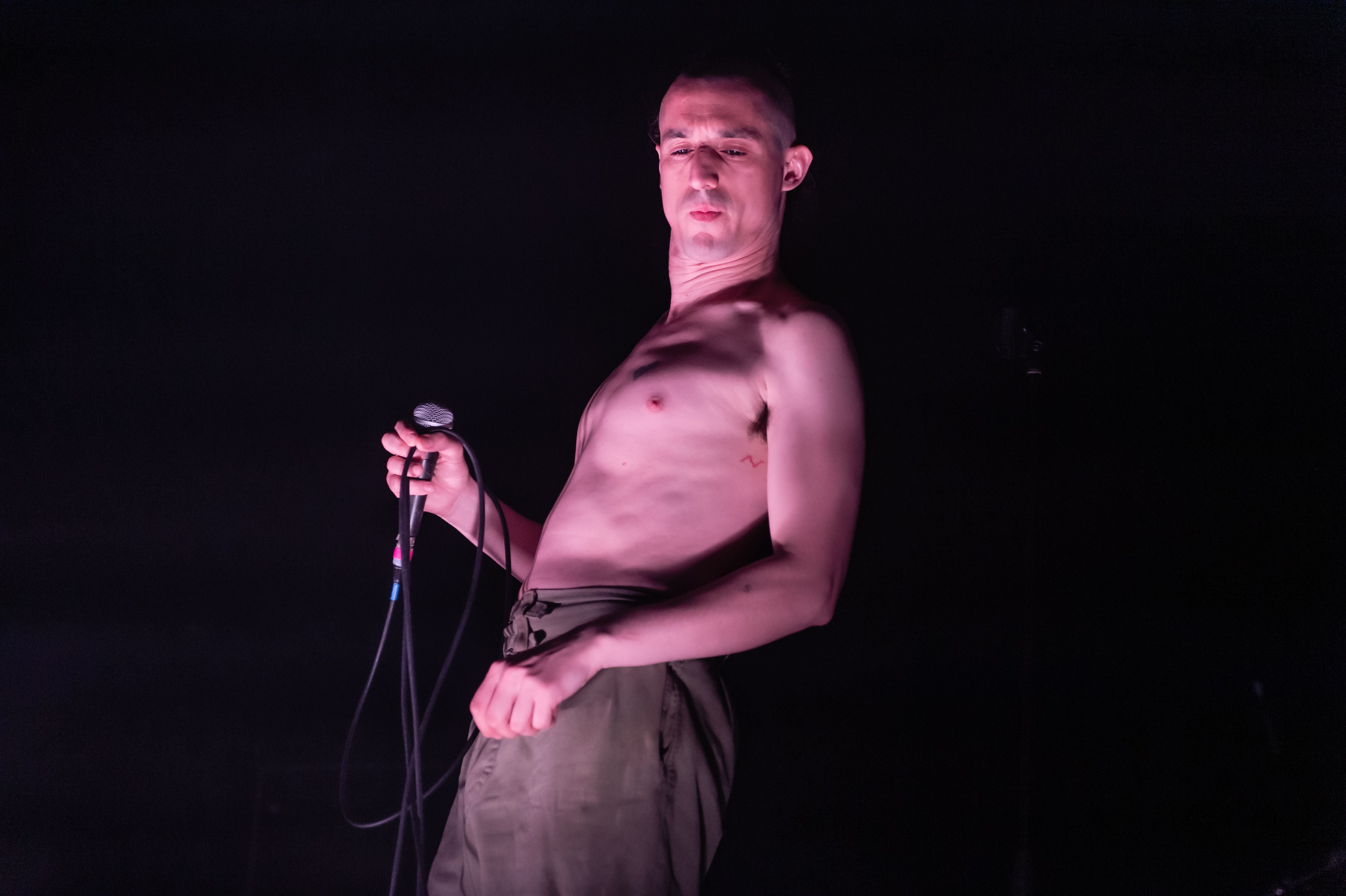 Saoudi performing with Fat White Family in 2019