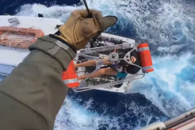 <p>A US Coast Guard helicopter crew rescues a fisherman who was bitten by a shark near Bimini. </p>