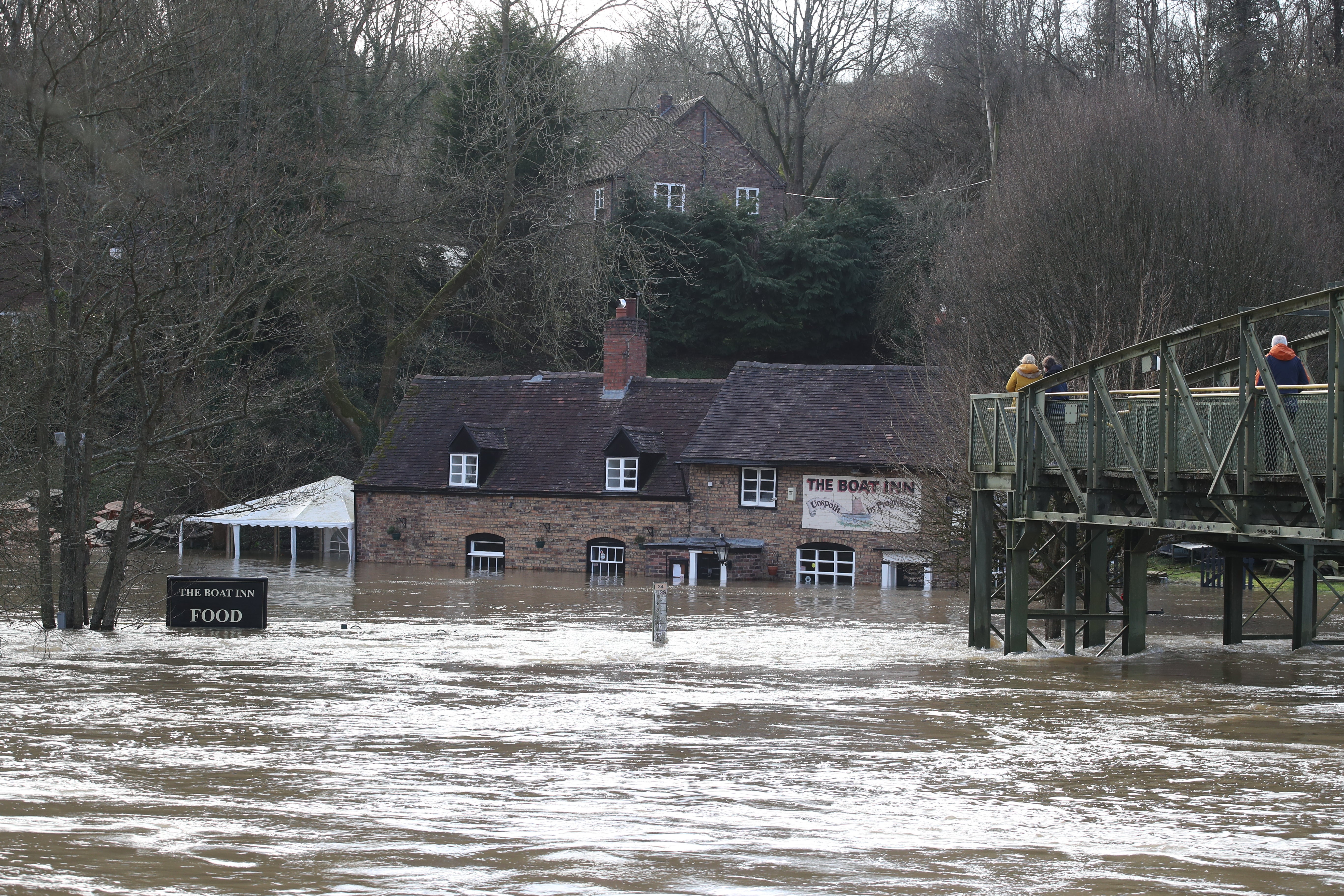 Flood waters from the River Severn surround The Boat Inn at Jackfield near Ironbridge, Shropshire (Nick Potts/PA)