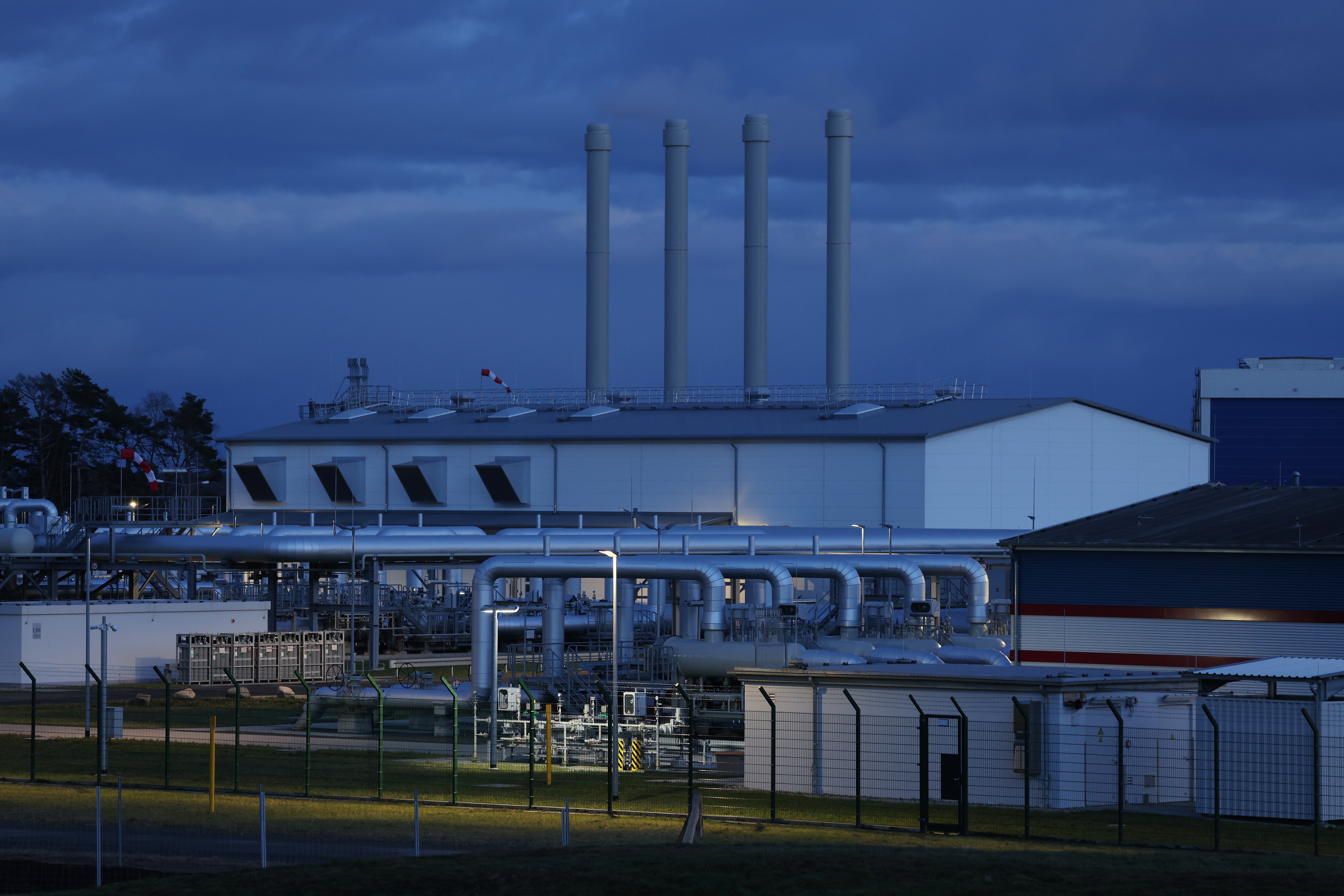 The receiving station for the Nord Stream 2 gas pipeline stands at twilight on February 02, 2022 near Lubmin, Germany. Nord Stream 2, which is owned by Russian energy company Gazprom