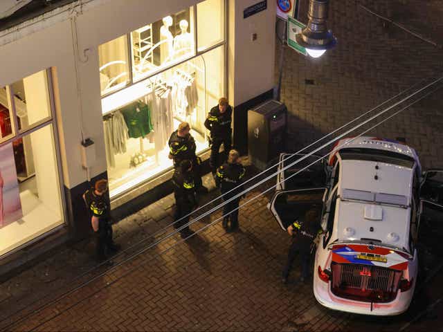 <p>Police officers attend a hostage situation in Leidseplein</p>