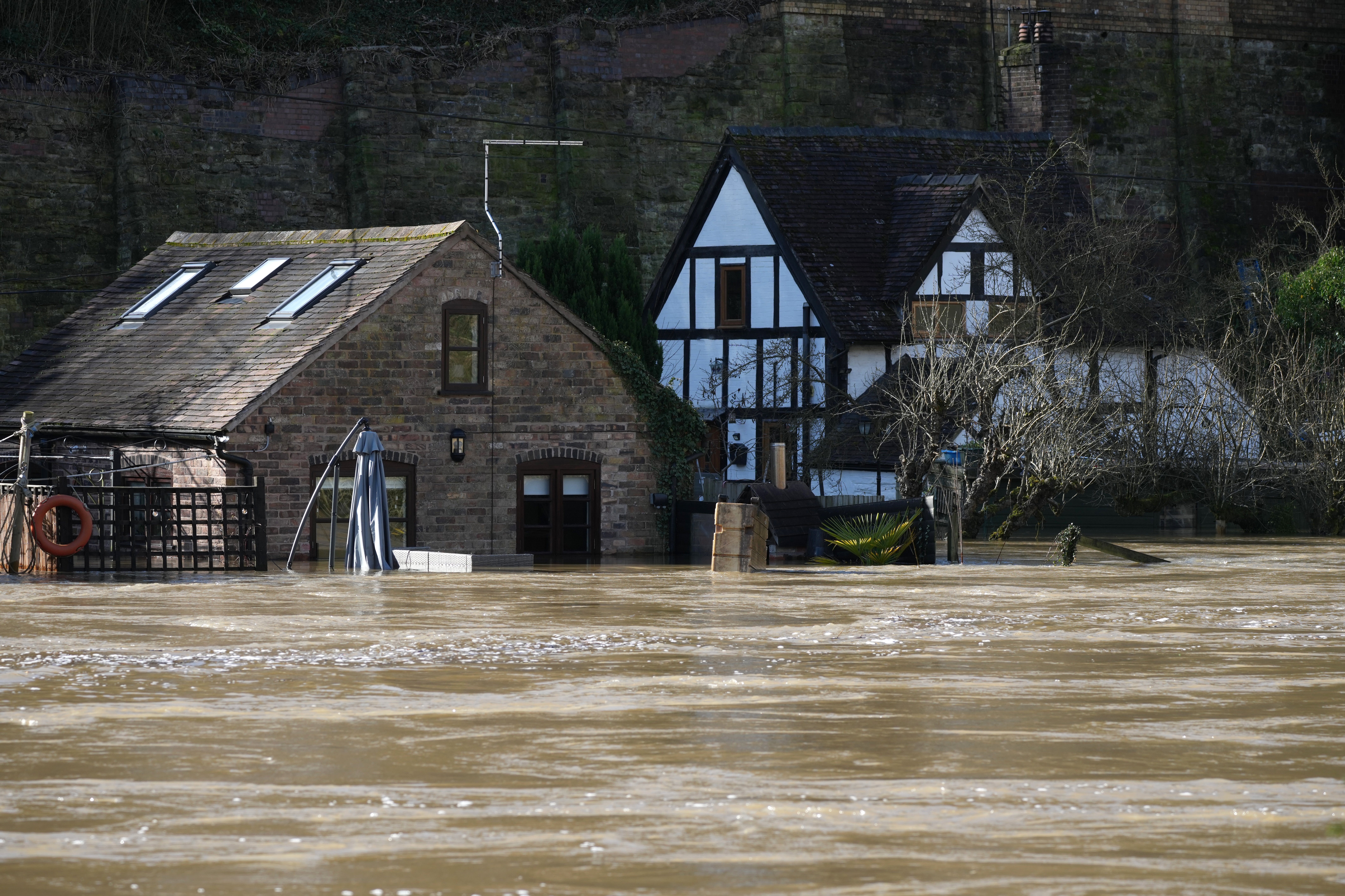 Homes surrounded by flood water from the River Severn after successive storms hit the UK on 22 February 2022 in Ironbridge, England