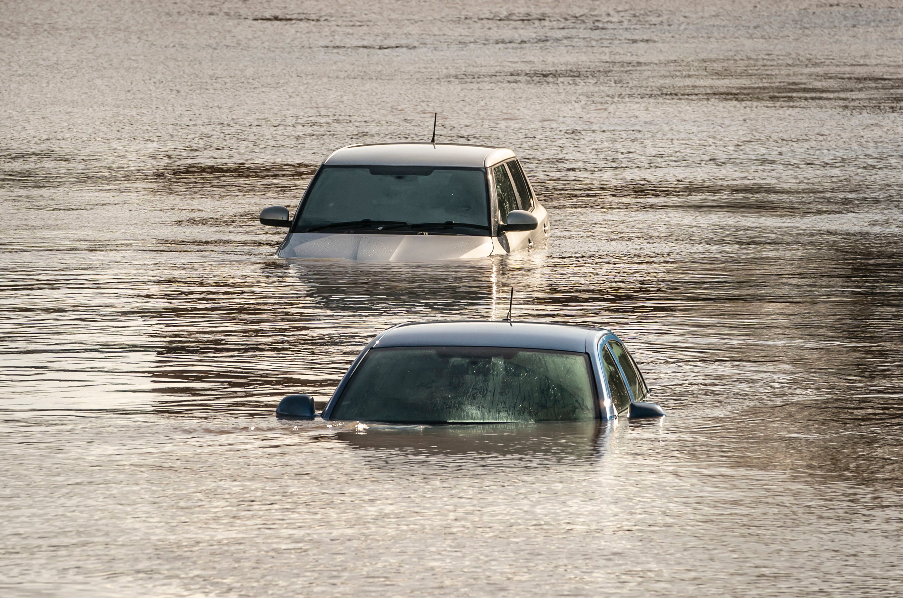 Cars stranded in flood water in York, Yorkshire, after the River Ouse overtopped its banks, 22 February 2022