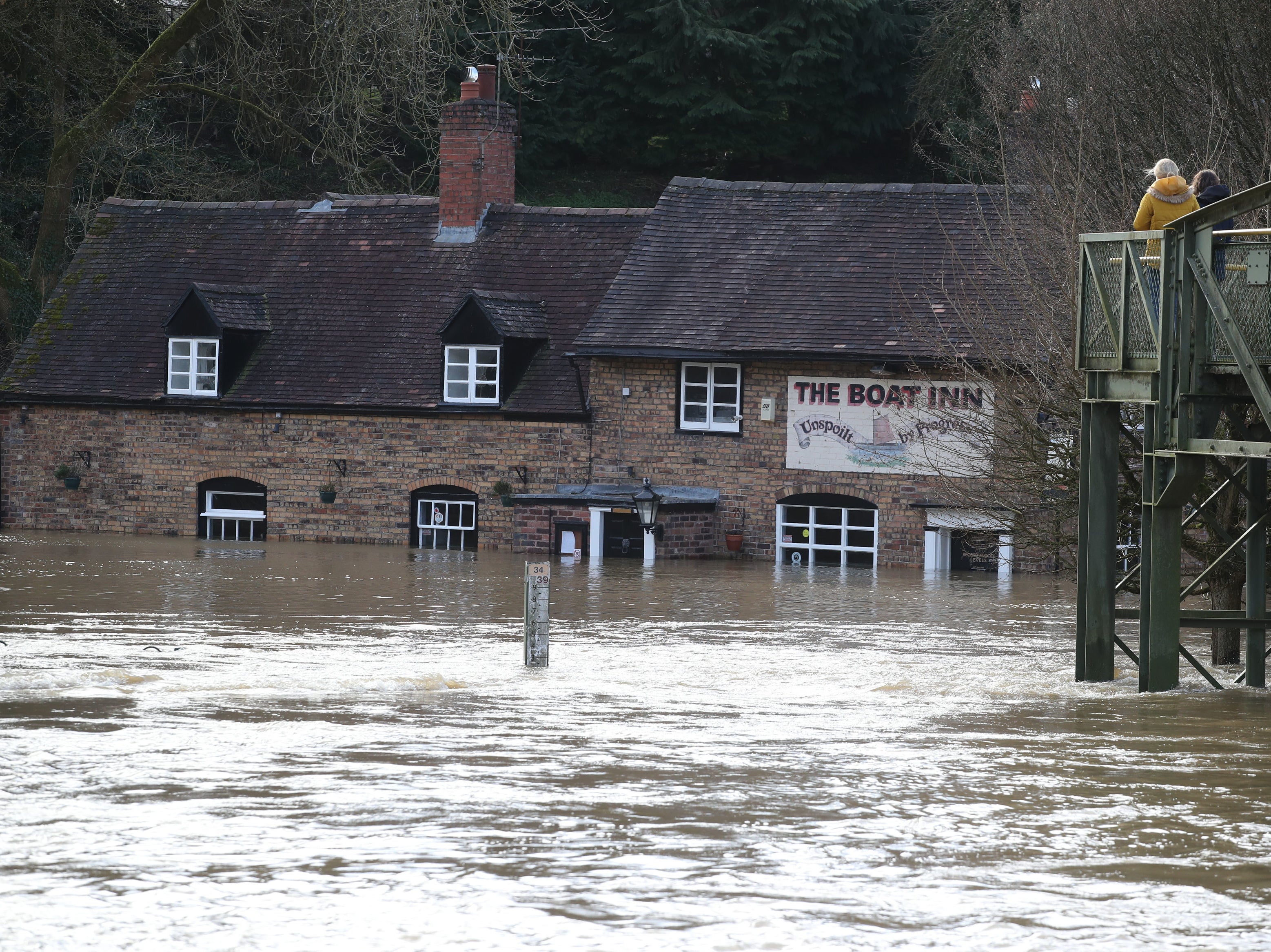 Flood waters from the River Severn surround The Boat Inn at Jackfield near Ironbridge, Shropshire, February 2022