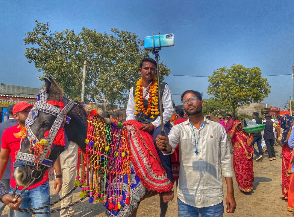 <p>Manoj Bairwa, a Dalit man from Rajasthan breaks the taboo and rides a horse for his wedding, an act that has often led to violence from upper caste groups</p>