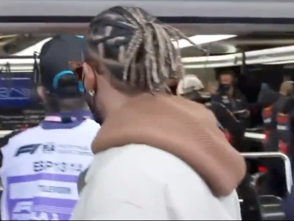 Lewis Hamilton takes sneak peek of rival Max Verstappen’s new Red Bull at Barcelona testing Lewis Hamilton takes sneak peek of rival Max Verstappen’s new Red Bull at Barcelona testing