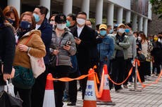 Grumbling grows as Hong Kong sticks with zero-COVID policy