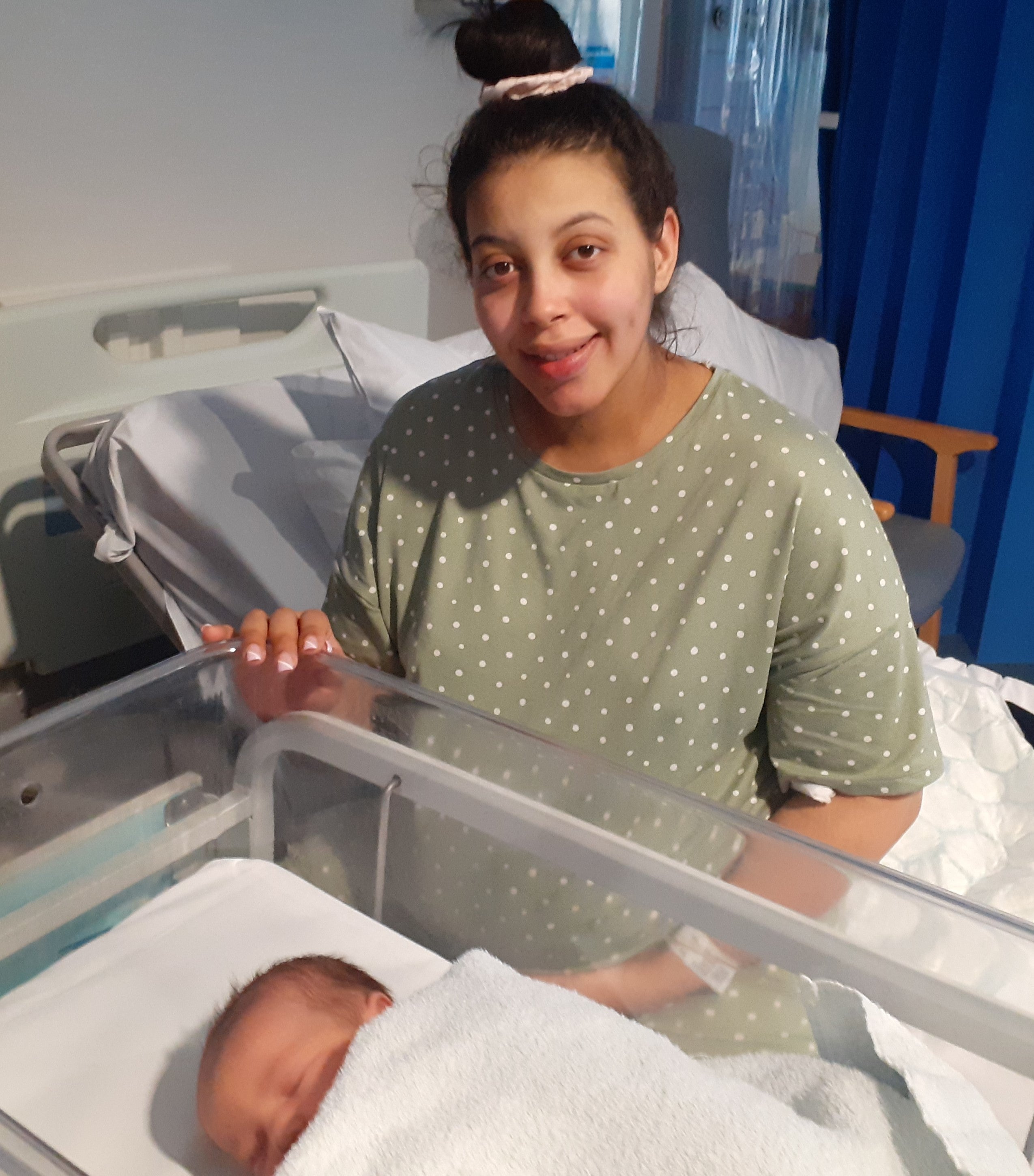 Mother Imogen and daughter Aurora, who was born on 22 February 2022 (Barking, Havering and Redbridge University Hospitals NHS Trust/PA)