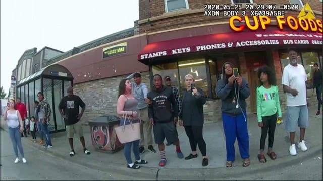 <p>Bodycam shows bystanders on the scene of George Floyd’s murder where they begged the officers to help the Black man</p>