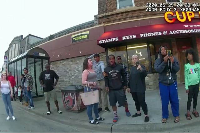 <p>Bodycam shows bystanders on the scene of George Floyd’s murder where they begged the officers to help the Black man</p>