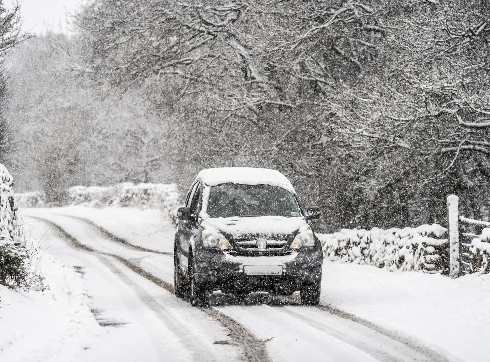Snow is bringing difficult driving conditions (Danny Lawson/PA)