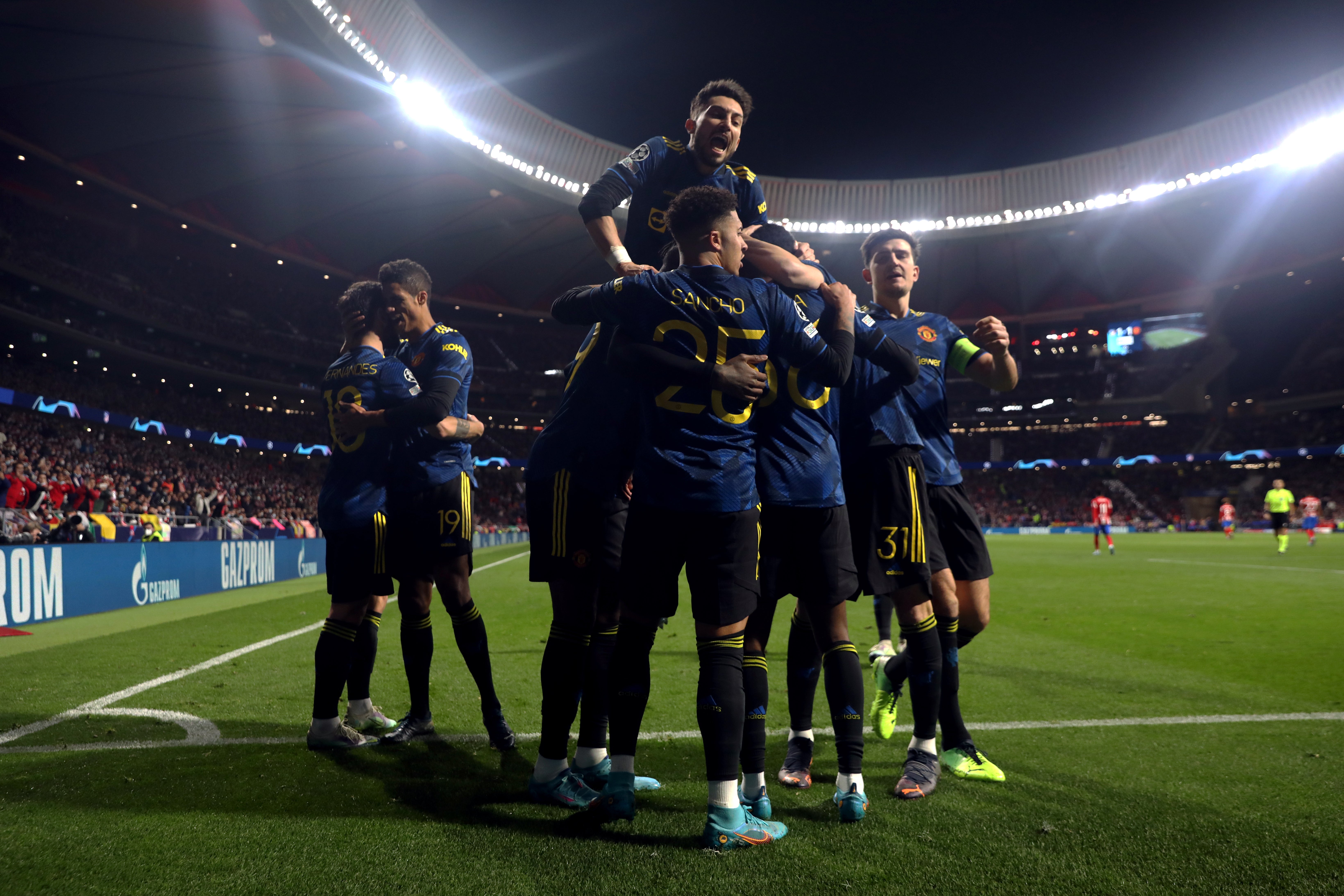 Manchester United celebrate Anthony Elanga’s equaliser (Isabel Infantes/PA)