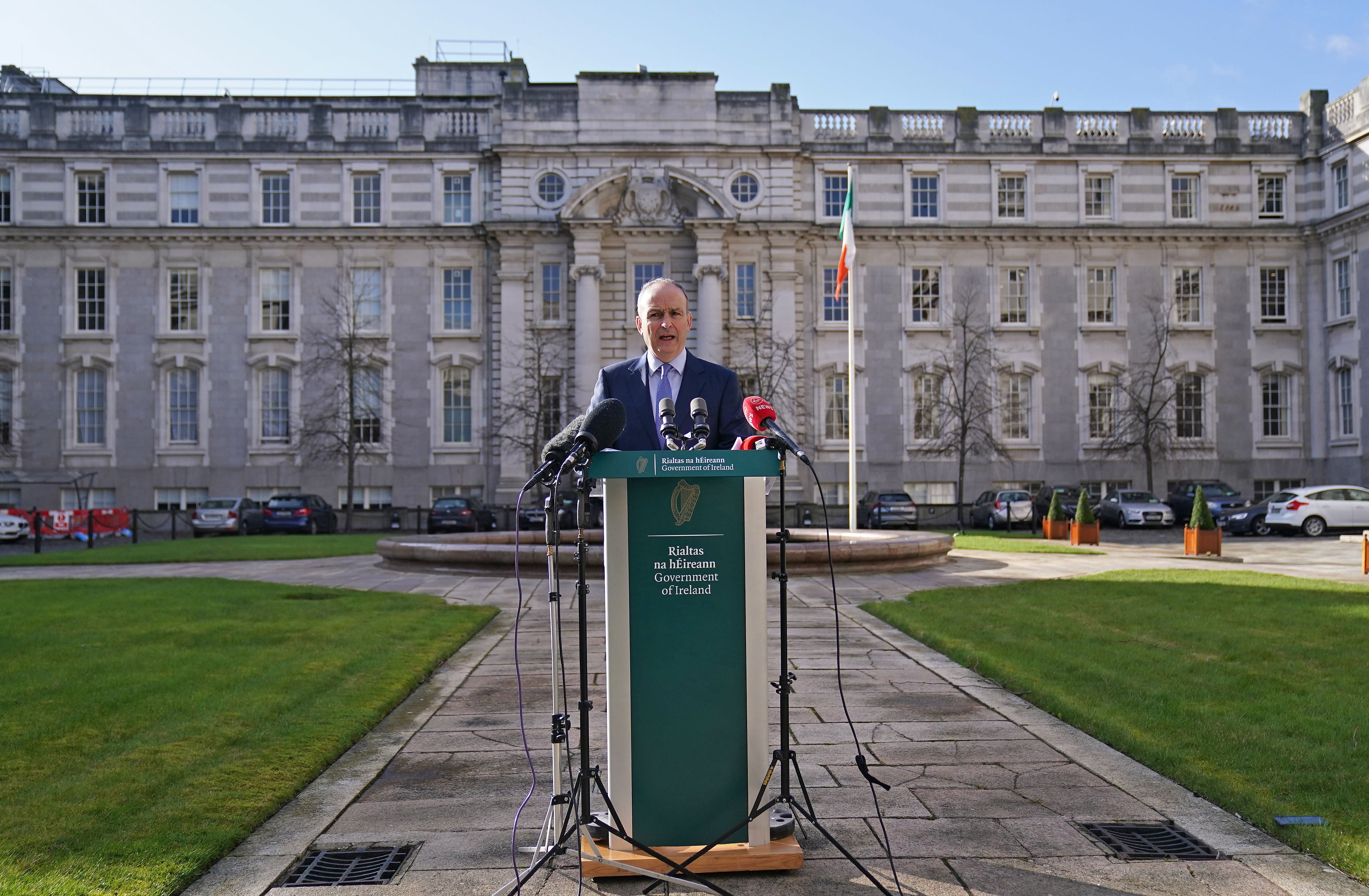 Taoiseach Micheal Martin speaking to the media at Government Buildings (Brian Lawless/PA)