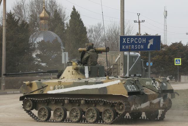 <p>An armoured vehicle drives along a street in eastern Ukraine after Russian President Vladimir Putin authorised a military operation in the country </p>