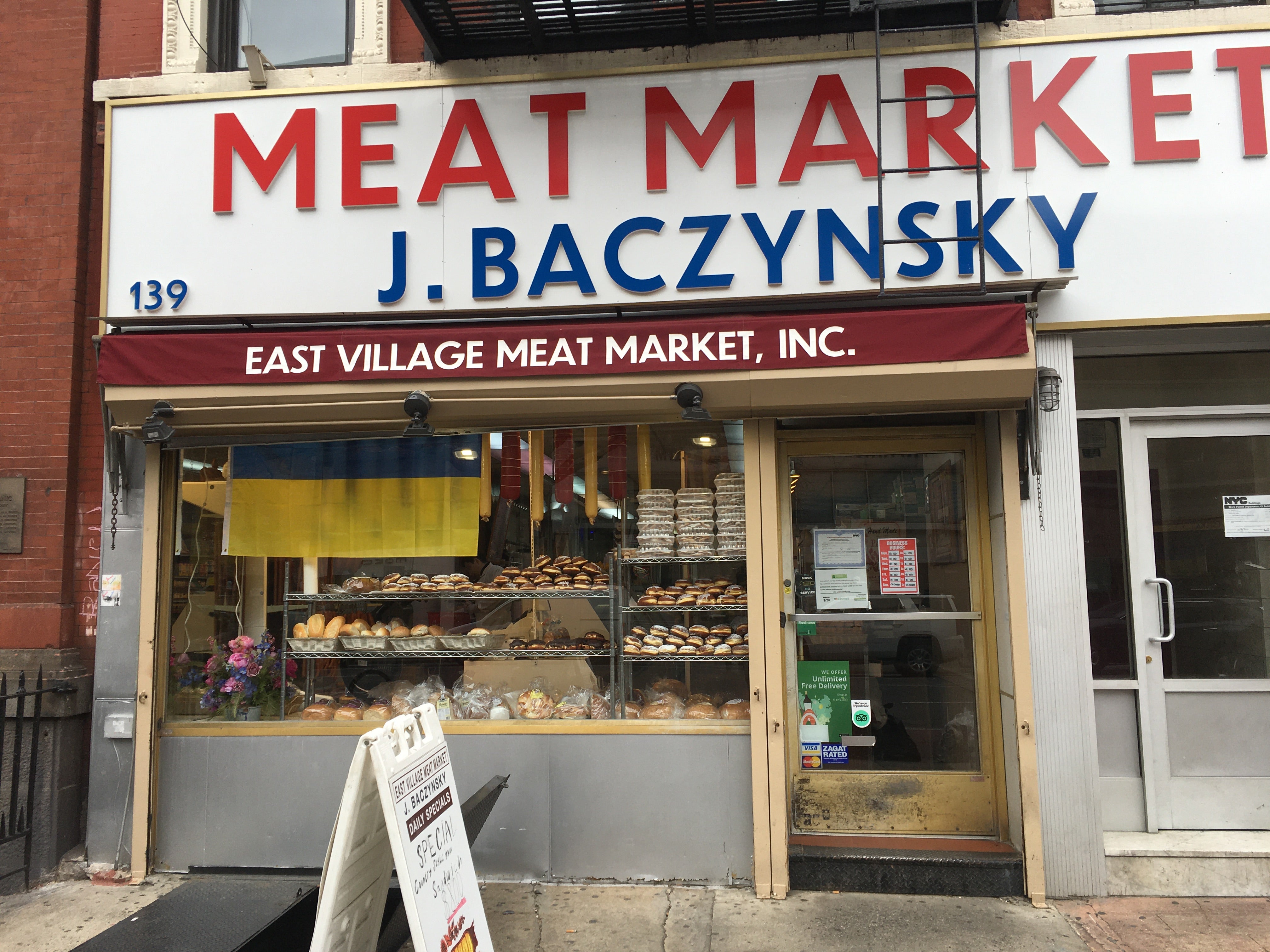 Ukrainian flag on display at the East Village Meat Market in the Little Ukraine neighbourhood of Manhattan’s East Village, on Thursday