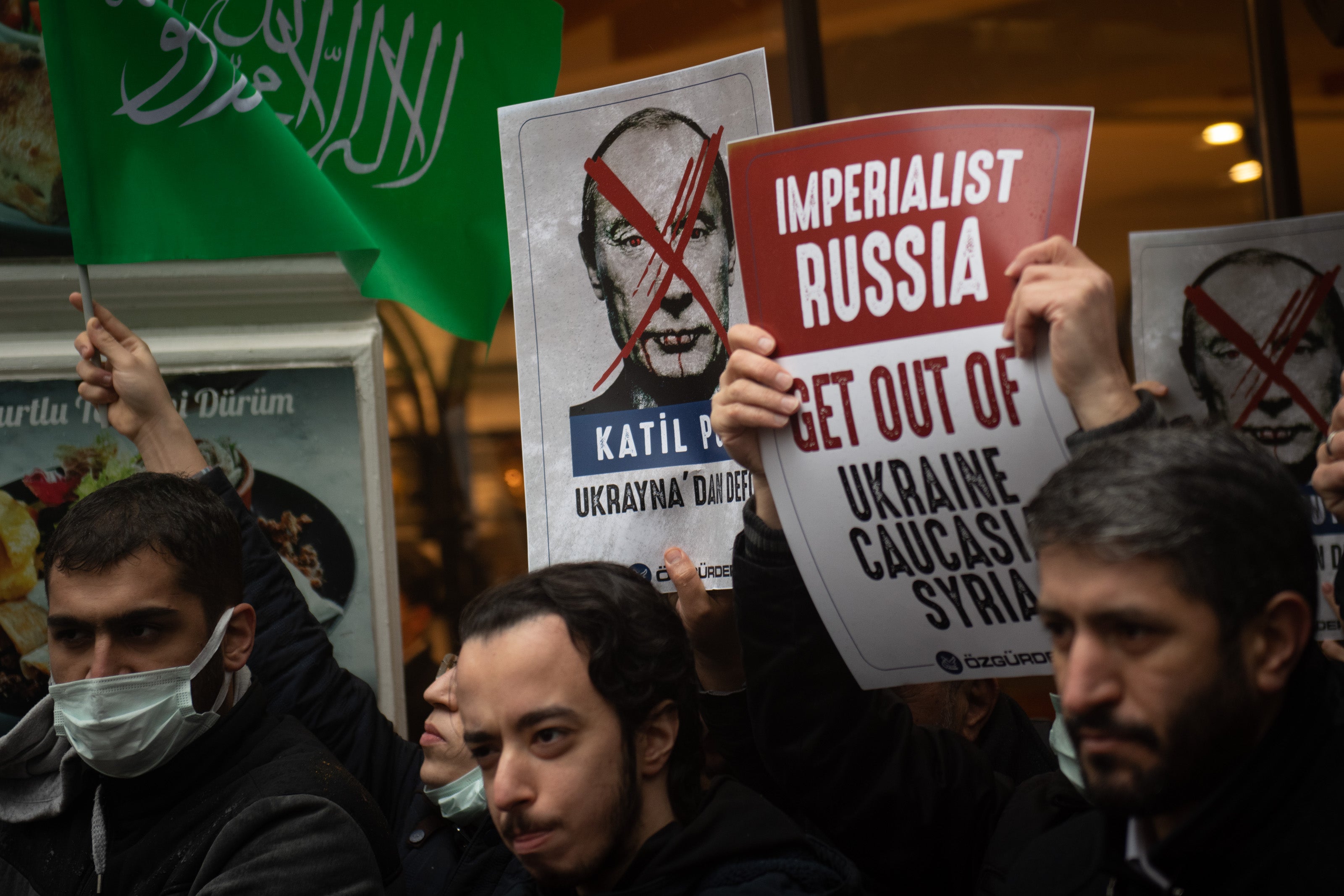 People protest against Russia’s invasion of Ukraine outside the Russian Consulate on 24 February in Istanbul, Turkey.