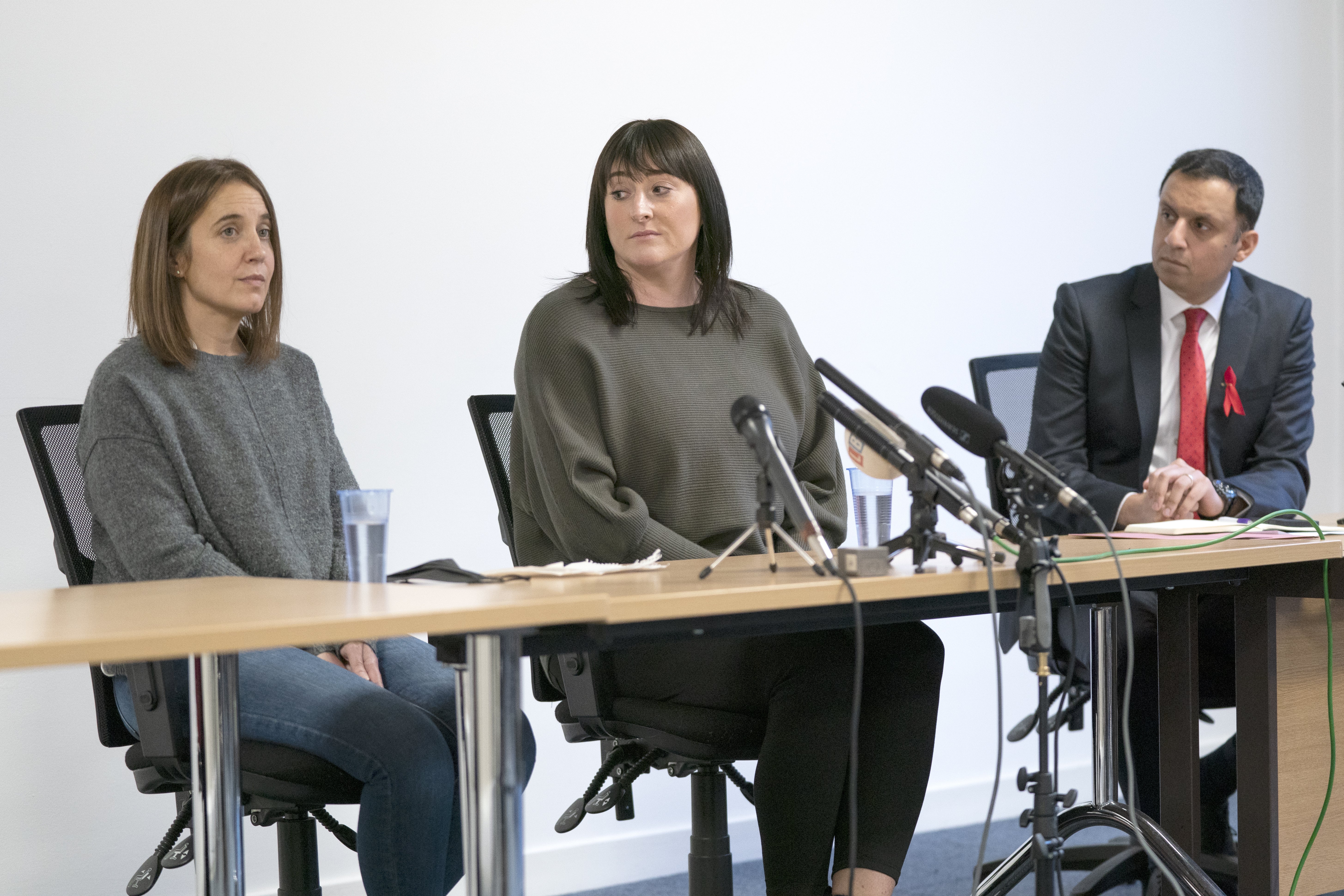 Louise Slorance, left, and Scottish Labour leader Anas Sarwar, right, have both condemned NHS Greater Glasgow and Clyde’s decision to give the board’s chief executive an ‘excellence’ award (Jane Barlow/PA)